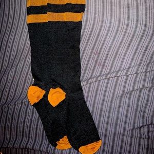 Brown and black compression stockings size small